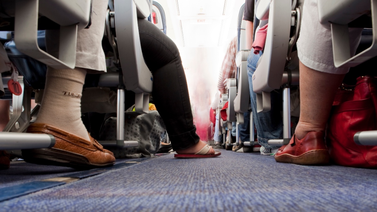 Passagiere im Flugzeug.